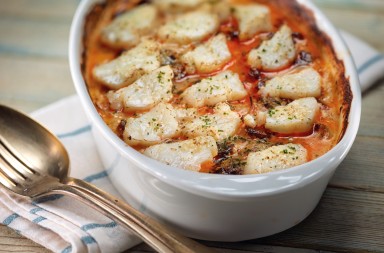 Gratín de cebolleta y bacalao