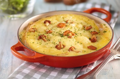 Patatas con queso fundido