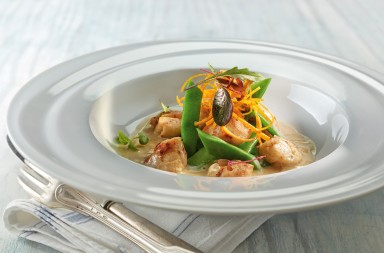 Vieiras con crema de panceta y alcachofas