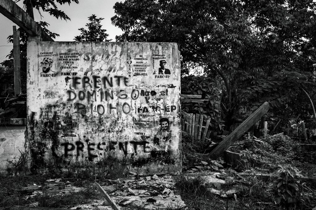 CAQUETA, COLOMBIA -APRIL 2016: A wall destroyed by war in the community of Santo Domingo del Caguan shows propaganda from FARC - EP. For fty-two years, the FARC-EP has fought in the con ict in Colombia as an armed movement. With the peace agreements reached in Havana on August 24, 2016, it begins its march towards a political movement. ( Photo by Alvaro Ybarra Zavala / Getty Images Reportage)