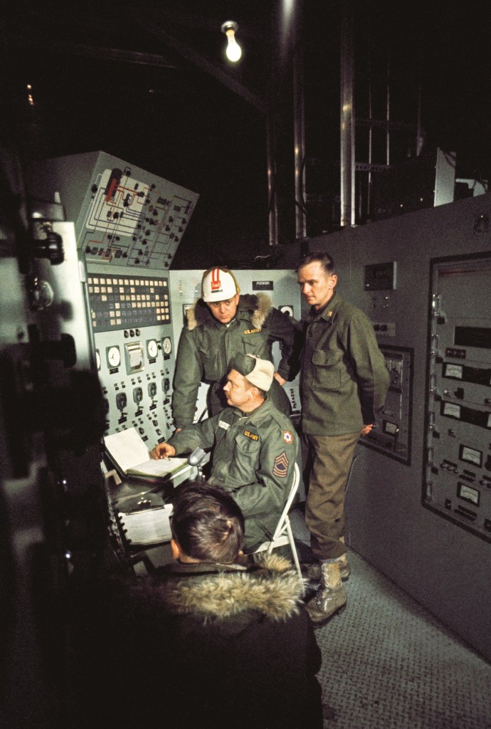 GREENLAND - MAY 01: Anxious specialists watch control panel of nuclear power plant, Camp Century, Greenland (Photo by W. Robert Moore/National Geographic/Getty Images)