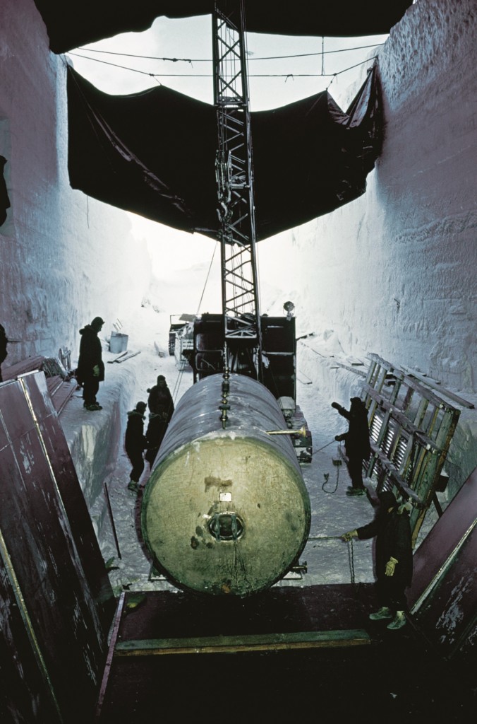 GREENLAND - MAY 01: Crane positions nuclear plant's waste tank, Camp Century, Greenland (Photo by W. Robert Moore/National Geographic/Getty Images)