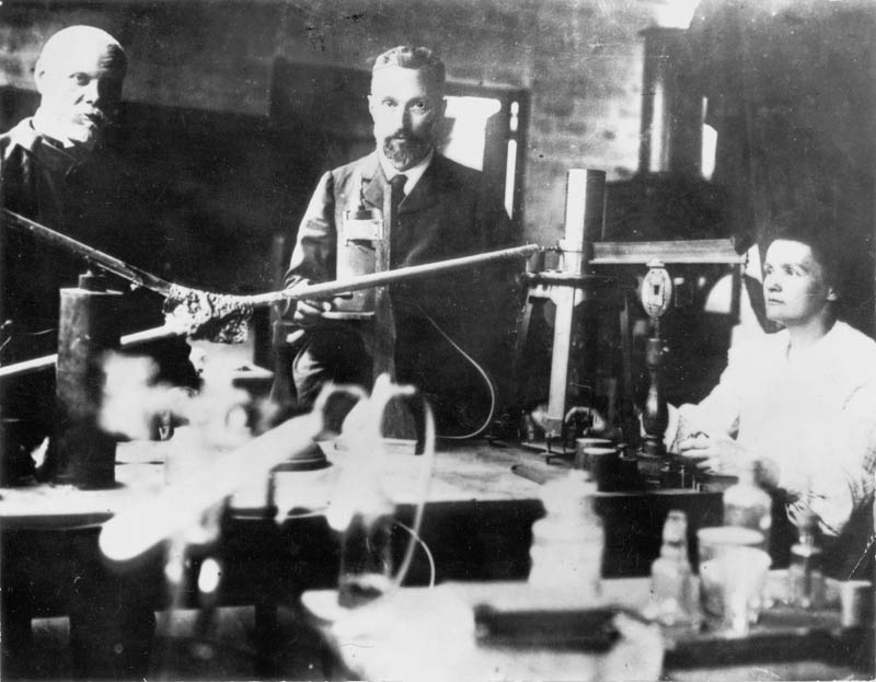 Marie Curie (1867-1935) Polish-born French physicist who, with her husband Pierre (1859-1906), centre, carried out research on radioactivity and shared the Nobel prize for physics with him and with Henri Becquerel in 1903