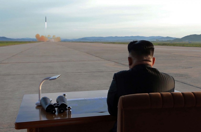 TOPSHOT - This undated picture released from North Korea's official Korean Central News Agency (KCNA) on September 16, 2017 shows North Korean leader Kim Jong-Un inspecting a launching drill of the medium-and-long range strategic ballistic rocket Hwasong-12 at an undisclosed location.
Kim vowed to complete North Korea's nuclear force despite sanctions, saying the final goal of his country's weapons development is "equilibrium of real force" with the United States, state media reported on September 16.  / AFP PHOTO / KCNA VIA KNS / STR / South Korea OUT / REPUBLIC OF KOREA OUT   ---EDITORS NOTE--- RESTRICTED TO EDITORIAL USE - MANDATORY CREDIT "AFP PHOTO/KCNA VIA KNS" - NO MARKETING NO ADVERTISING CAMPAIGNS - DISTRIBUTED AS A SERVICE TO CLIENTS
THIS PICTURE WAS MADE AVAILABLE BY A THIRD PARTY. AFP CAN NOT INDEPENDENTLY VERIFY THE AUTHENTICITY, LOCATION, DATE AND CONTENT OF THIS IMAGE. THIS PHOTO IS DISTRIBUTED EXACTLY AS RECEIVED BY AFP.  /          (Photo credit should read STR/AFP/Getty Images)