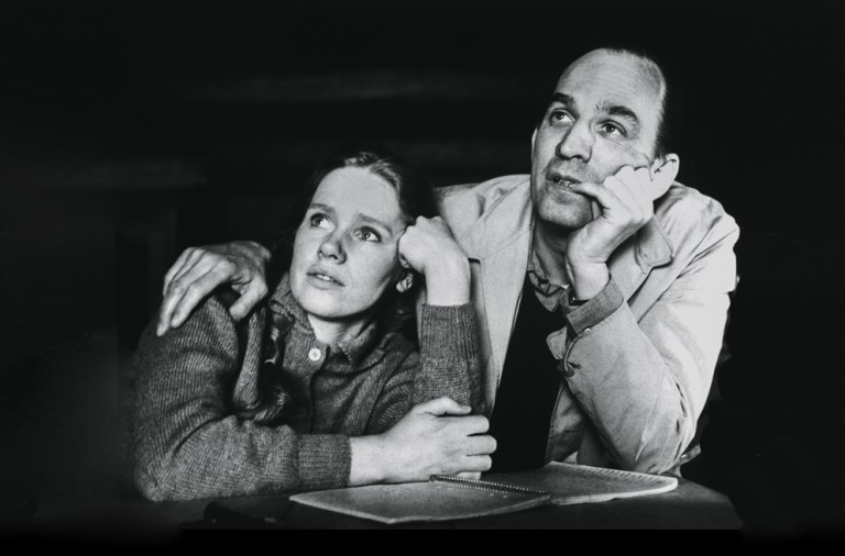 (Original Caption) 4/5/1968- Stockholm, Sweden- Ingmar Bergman and Actress Liv Ullman talk about "Hour of the Wolf" during a break in shooting of that film in Stockholm. Bergman has directed Liv in two successive movies and a third is planned. There has been talk that Bergman may give Liv top billing in his personal life by making her his wife as well as his leading lady.