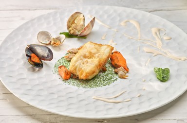 Merluza a la mayonesa de moluscos