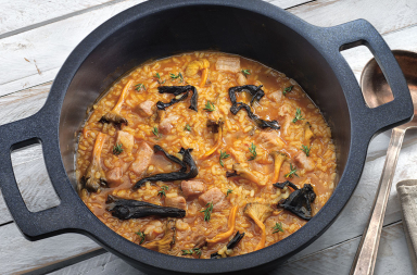 Arroz caldoso de secreto ibérico y setas